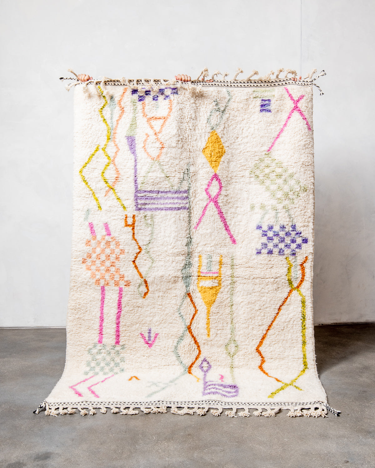 Modern, designer, handcrafted Berber rug from Morocco. Beniourain carpet with beautiful colours and patterns and fluffy wool texture.